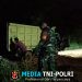 Hingga Malam Hari, Anggota Satgas TMMD ke 128 Kodim 0420/Sarko Tetap Bekerja Turunkan Material Batu di Lokasi Perbaikan Jalan
