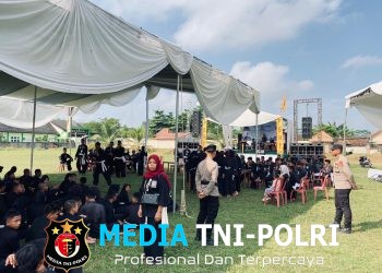 Polres Tulang Bawang Barat Laksanakan Pengamanan Kegiatan Pengesahan Warga PSHT di Lapangan Tiyuh Marga Kencana