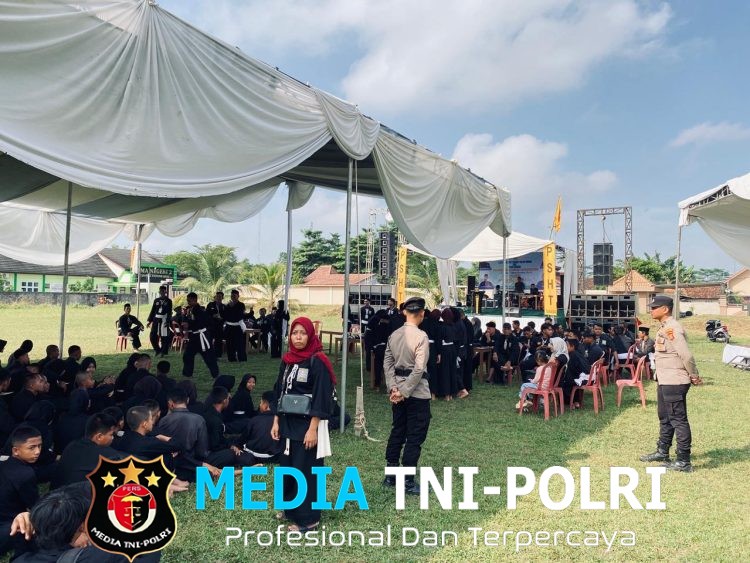 Polres Tulang Bawang Barat Laksanakan Pengamanan Kegiatan Pengesahan Warga PSHT di Lapangan Tiyuh Marga Kencana