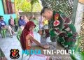 Satgas Pamtas RI–Malaysia Yonarmed 19/Bogani Gelar Pengobatan Gratis bagi Masyarakat Desa Tombolango