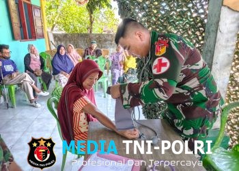 Satgas Pamtas RI–Malaysia Yonarmed 19/Bogani Gelar Pengobatan Gratis bagi Masyarakat Desa Tombolango