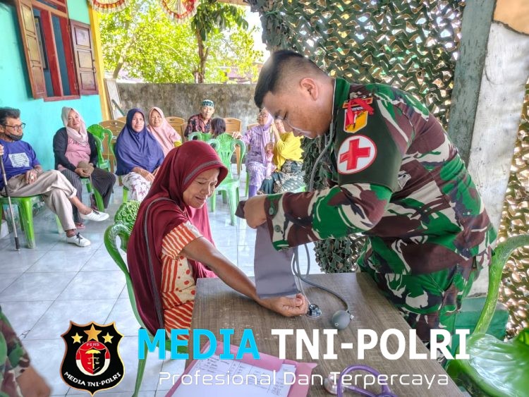 Satgas Pamtas RI–Malaysia Yonarmed 19/Bogani Gelar Pengobatan Gratis bagi Masyarakat Desa Tombolango