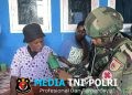 Syukur dan Senyum, Satgas Yonif 521/DY Berikan Pelayanan Gratis di Distrik Kobakma