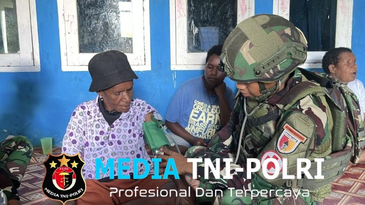 Syukur dan Senyum, Satgas Yonif 521/DY Berikan Pelayanan Gratis di Distrik Kobakma