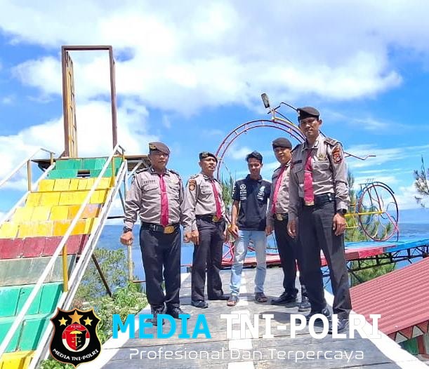 Di Balik Senyum Ramah Aipda Rolan Manik Sosok Personel Sat Pam Obvit Polres Simalungun yang Tak Kenal Lelah Kawal Keamanan Wisata Danau Toba