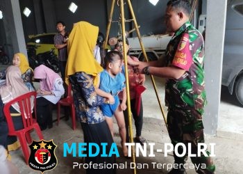 Wujud Babinsa Tawangrejo Dampingi Kegiatan Posyandu, Demi Tingkatkan Layanan Kesehatan Masyarakat