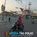 Di Pertigaan Pengairan, Polisi Menjaga Pagi Tambun Selatan Tetap Mengalir