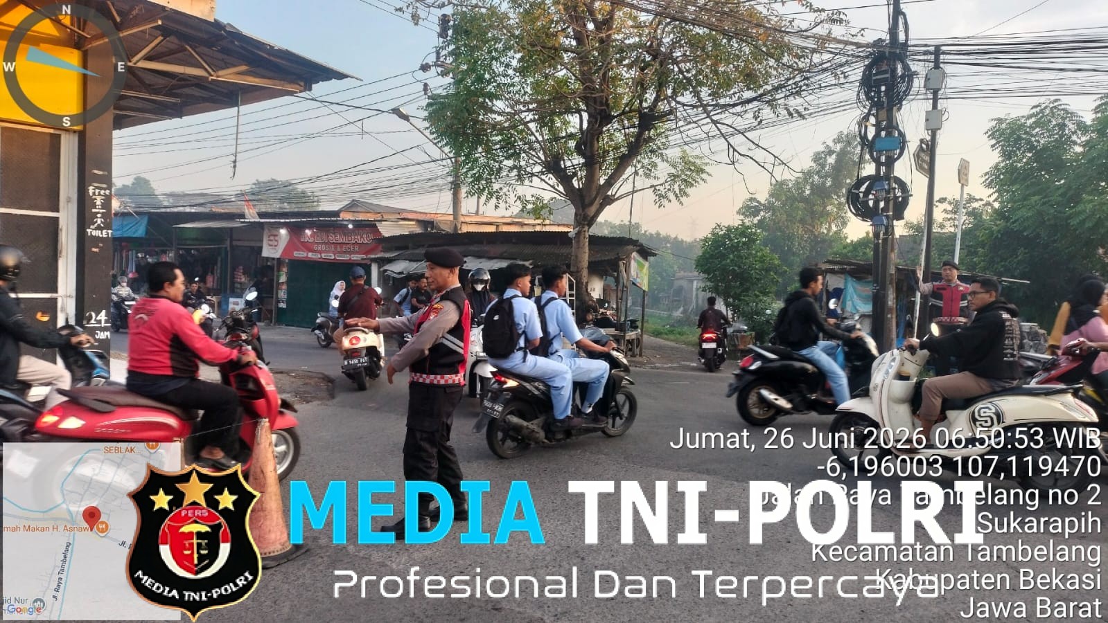 Jaga Jakarta Jaga Bekasi, Polsek Tambelang Hadir Mengatur Arus Pagi di Pertigaan Pasar Tambelang