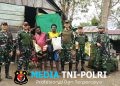 Satgas Yonif 123/Rajawali Salurkan Bantuan Sembako kepada Warga Kampung Emnam