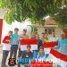 Jelang HUT Ke-81 RI, Polsek Abung Selatan Bersama Uspika Bagikan Bendera Merah Putih kepada Masyarakat