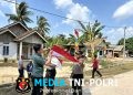 Sambut HUT RI Ke-81, Kapolres Mesuji Bersama Personel Sosialisasi dan Bagikan Bendera Merah Putih kepada Warga dan Pengguna Jalan