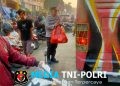 Polsek Cikarang Utara Atur Lalu Lintas di Depan Penampungan Pasar Baru, Arus Kendaraan Ramai Lancar