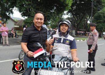 Polres Langkat Bagikan 500 Bendera Merah Putih, Bangkitkan Semangat Kemerdekaan di Tengah Masyarakat