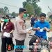 Peduli Kesehatan Warga di Tengah Kabut Asap, Forkopimca Mandor Bersama PT Borneo Edo Sejahtera Bagikan Masker dan Vitamin
