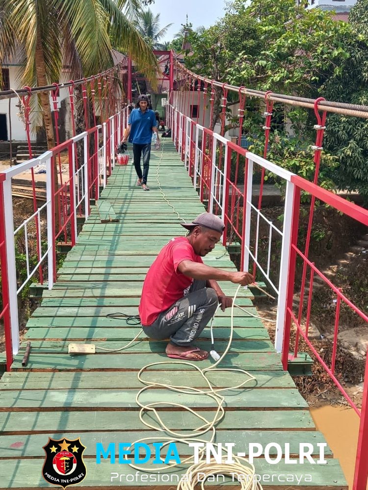 Karya Bakti TNI AD Kebutt Pembangunan Jembatan Gantung Desa Teluk Tigo, Harapan Baru bagi Masyarakat