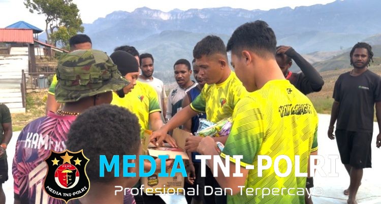 Satgas Pamtas RI-PNG Yonif 645/GTY melaksanakan kegiatan Olahraga Bersama Dengan masyarakat di Distrik Napua