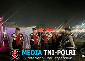 Polres Mesuji – Personil Siaga Kompi III Amankan Acara Pertunjukan Seni Budaya di Alun-Alun Simpang Pematang