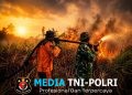 Pantang Menyerah di Tengah Kobaran Api Babinsa Koramil 402-12 Pemulutan Berhasil Padamkan Karhutla 2,5 Hektar