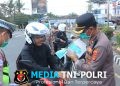 Dampak Erupsi Gunung Anak Krakatau, Polres Lampung Utara Bagikan Masker kepada Warga