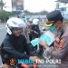 Dampak Erupsi Gunung Anak Krakatau, Polres Lampung Utara Bagikan Masker kepada Warga