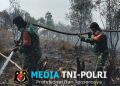 Perjuangan Tanpa Kenal Lelah, Babinsa Jinakkan Api di Kebun Raya Sriwijaya