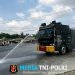 Sat Samapta Polres Mesuji Lakukan Penyiraman Jalur Jalan Utama, Antisipasi Dampak Abu Vulkanik Erupsi Gunung Anak Krakatau