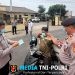 Polsek Tambelang Bagikan 100 Masker kepada Pengguna Jalan Antisipasi Paparan Abu Vulkanik