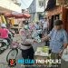 Kapolsek Padang Selatan AKP NirdesAli Bagikan Masker Gratis Untuk Warga Di Pasar Tanah Kongsi