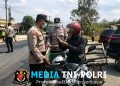 Kompi Siaga II Polres Mesuji Gelar KRYD dan Bagikan Masker, Jaga Kamtibmas dan Rasa Aman Pengguna Jalan Lintas Timur