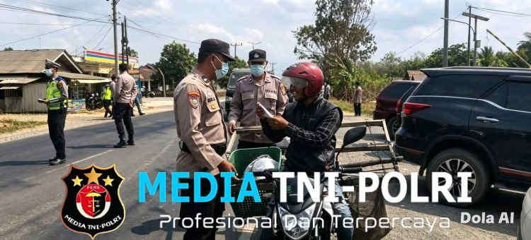 Kompi Siaga II Polres Mesuji Gelar KRYD dan Bagikan Masker, Jaga Kamtibmas dan Rasa Aman Pengguna Jalan Lintas Timur