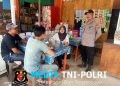 Di Balik Kabut Asap, Polisi Tetap Hadir Sapa Warga Saat Patroli Siang