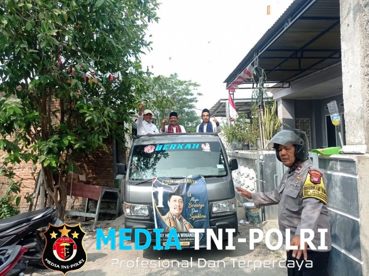 Polsek Cabangbungin Berikan Pelayanan Pengamanan dan Pengawalan Kampanye Cakades Jayalaksana