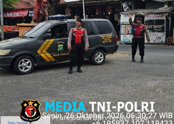 Layani Pengguna Jalan di Jam Sibuk, Polsek Tambelang Pastikan Arus Lalu Lintas Pagi Aman dan Lancar